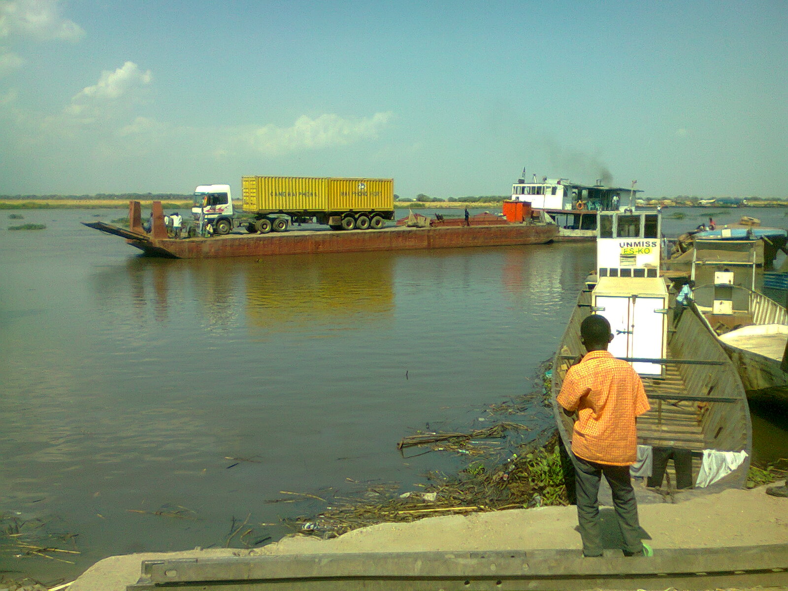 Trojan Trucks Crossing Malakal River with Uniceef Supplies